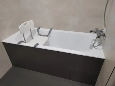 a white bath tub with a faucet in a bathroom at Enter City Center in Prague