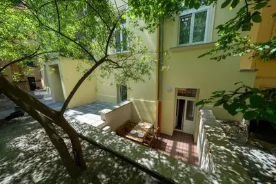 an aerial view of a house with a tree at Downtown - Apart Hotel Zborovska in Prague