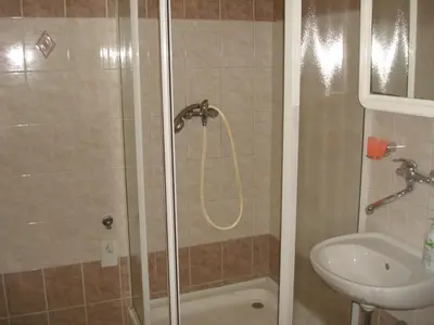 a bathroom with a shower and a sink at EASY JOURNEY Apartments in Prague