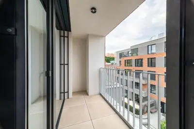 a balcony with a view of a building at Apartment Michelská in Prague