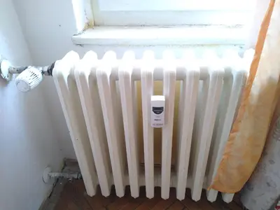 a radiator in a room with a window at Best Location in Prague - Old Town in Prague