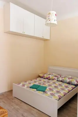 a bedroom with a bed in a room with at Nice big apartment in the city center in Prague