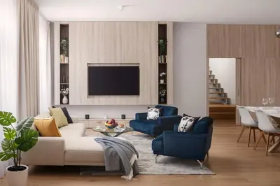 a living room with a white couch and blue chairs at U Pujcovny Apartment Old Town Prague in Prague
