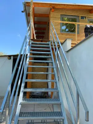 a set of stairs leading up to a house at Apartmán - E - Vyhlídka nad řekou in Zdiby