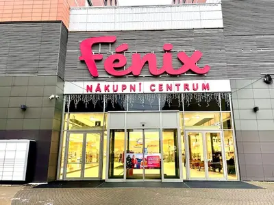 a store with a sign on the front of it at Entire Apartment, near Clarion, O2 Arena, Metro 3 min, Easter market in City Center 15 min in Prague