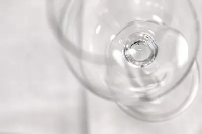 a clear wine glass sitting on top of a table at Hotel Energie in Prague