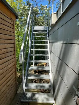 a set of stairs leading up to a house at Apartmán - F - Vyhlídka nad řekou in Zdiby