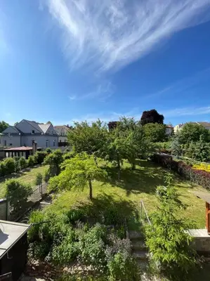 a view of a yard with trees and bushes at Apartmán Na Polabí 2 in Mělník