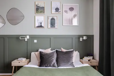a bedroom with a green and white bed with pillows at TurnKey I National Museum Apartments in Prague
