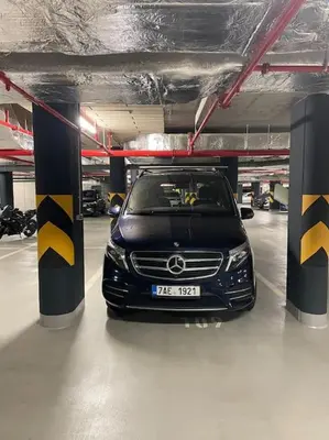a car is parked in a parking garage at Apartment Karel with garage parking in Prague