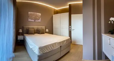 a bedroom with a large bed in a room at Apartment Dagmar Burešové in Prague