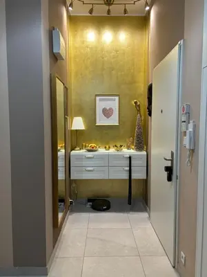 a bathroom with a vanity with a mirror and a sink at Apartment Dagmar Burešové in Prague