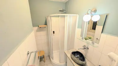a bathroom with a shower and a sink at Flat in Zizkov -204- in Prague