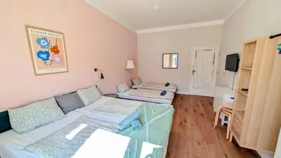 a small room with a bed and a couch at Flat in Zizkov -401- in Prague