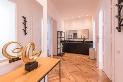 a room with a sculpture on a table at New design APT - central location Wenceslas Square in Prague