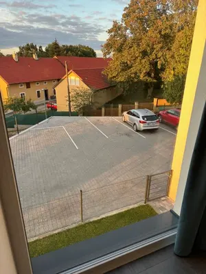 a view from a window of a parking lot at Byt apartman 2rooms 76m2 all new in Prague