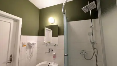 a bathroom with a shower and a sink and a toilet at Flat in Prague -503- in Prague