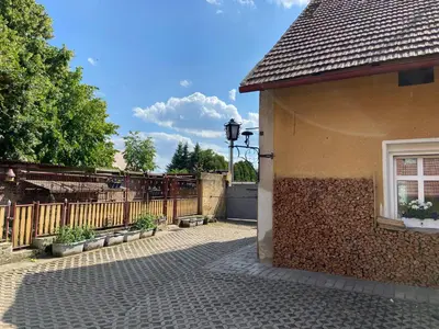 a building with a window and a fence at Ubytování u babičky in Peruc