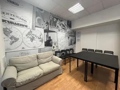 a living room with a couch and a table at Powder Tower Suites in Prague