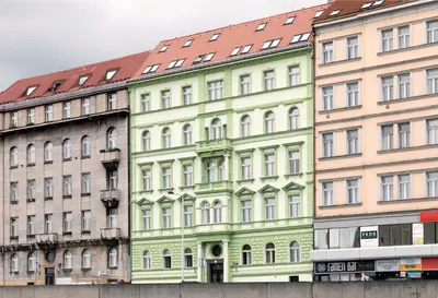 a row of tall buildings in a city at TurnKey I Elegant Studio by National Museum in Prague