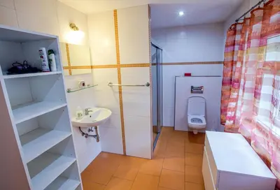 a bathroom with a sink and a toilet at Garden in the city in Prague