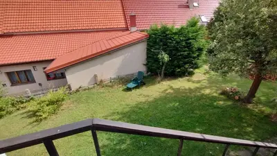 an aerial view of a yard with a house at Prague Zbraslav Old Garden in Prague