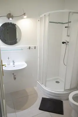 a bathroom with a shower and a sink at 2 Bed Flat - Sleeps 9 - Pets - Smoking on terrace in Prague