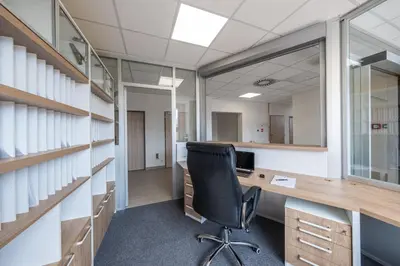 an office with a desk and a chair at Penzion BIG HOUSE in Prague