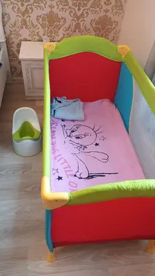 a toy bed with a hello kitty blanket on it at Viaducto de Karlín - Aparment in Prague
