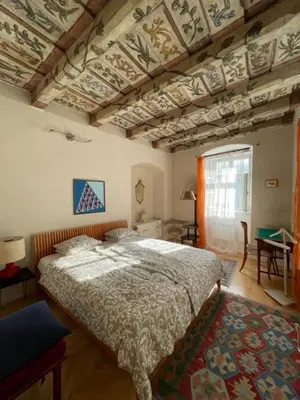 a bedroom with a bed and a coffered ceiling at 1 Bed Flat - Sleeps 2 - Pets - Wifi in Prague