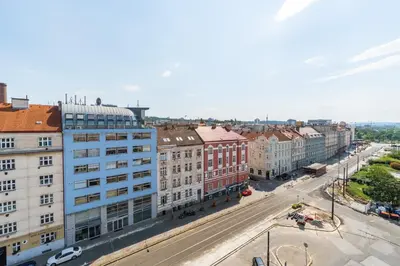 an aerial view of a city street with buildings at Brand new one bedroom apartment #54 in brand new building with free parking in Prague