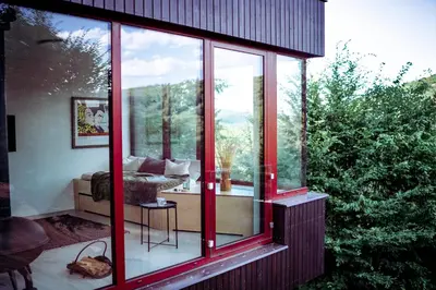 a glass house with a view of the outdoors at Chata nad Kocábou in Štěchovice