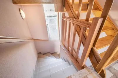 an overhead view of a staircase in a house at Okouzlující vila u jezera Lhota in Lhota