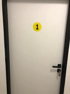 a door with a number one sign on it at UBYTOVNA SK Posázavan Poříčí nad Sázavou in Poříčí nad Sázavou