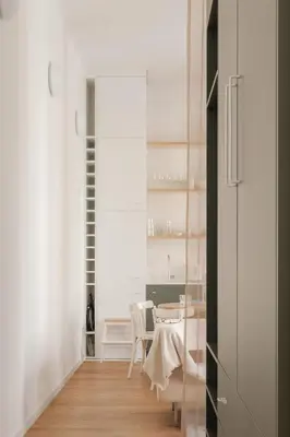 a kitchen and dining room with a table and chairs at Prague Days - Spacious City Center Studios next to the Powder Tower in Prague