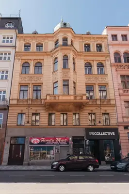 a building with a car parked in front of it at Prague Days - Spacious City Center Studios next to the Powder Tower in Prague