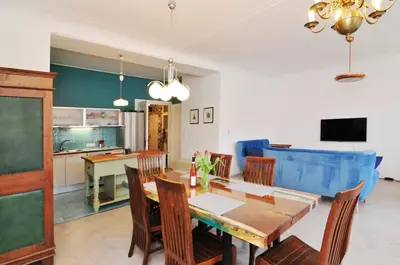a kitchen and dining room with a table and chairs at Prague OLD TOWN Cozy Luxury Apartman in Heart of City in Prague