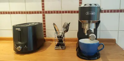 a coffee maker and a juicer sitting on a counter at Triple King Size Balcony Suite in Prague
