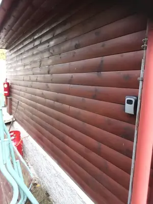 a wall that is made out of wood at Apartmánová chata Martina in Hradištko
