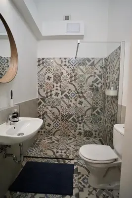 a bathroom with a sink and a toilet at TRUHLÁŘSKÁ 4 APARTMENT in Prague