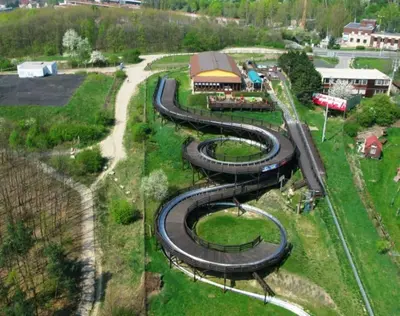 a set of train tracks with a toy train at Finnem Rentals Varnsdorfská in Prague