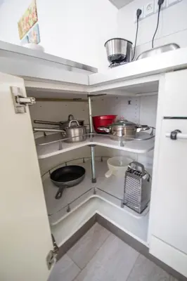 a small kitchen with some pots and pans in it at Ruterra Apartment Charles Bridge in Prague