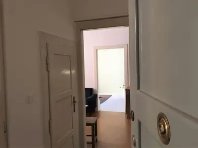 an open door to a room with a hallway at Byt v srdci Žižkova Praha 3 in Prague
