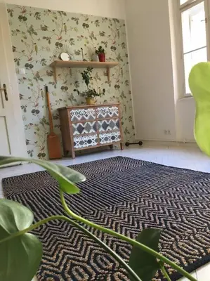 a room with a black and white rug on the floor at Byt v srdci Žižkova Praha 3 in Prague