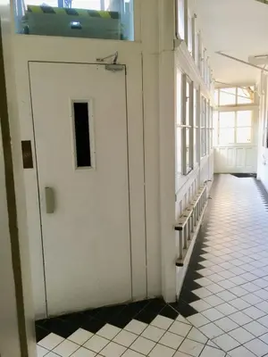 an empty hallway with a door in a building at Historic Centre Apartments IV in Prague