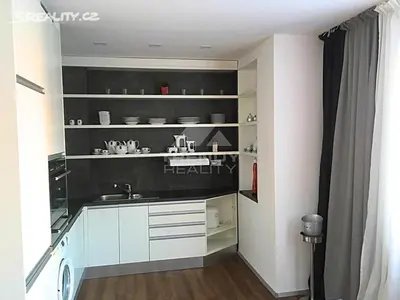 a kitchen with a sink and a counter top at Apartmán 2+kk, 50 m2 v klidné lokalitě. 10 min od centra Prahy. in Prague