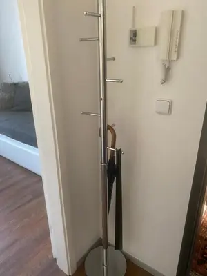 a glass shower door in a room with a bed at Apartmán 2+kk, 50 m2 v klidné lokalitě. 10 min od centra Prahy. in Prague