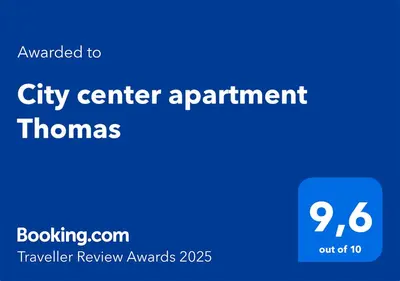 a blue sign that reads city center apartment thomass at City center apartment Thomas No1 in Prague