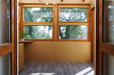 a room with a large window in a house at Entire house with garden near Prague in Benešov