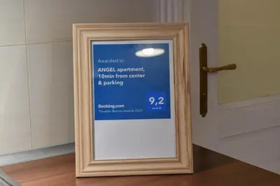 a framed sign sitting on top of a table at ANGEL apartment Prague in Prague